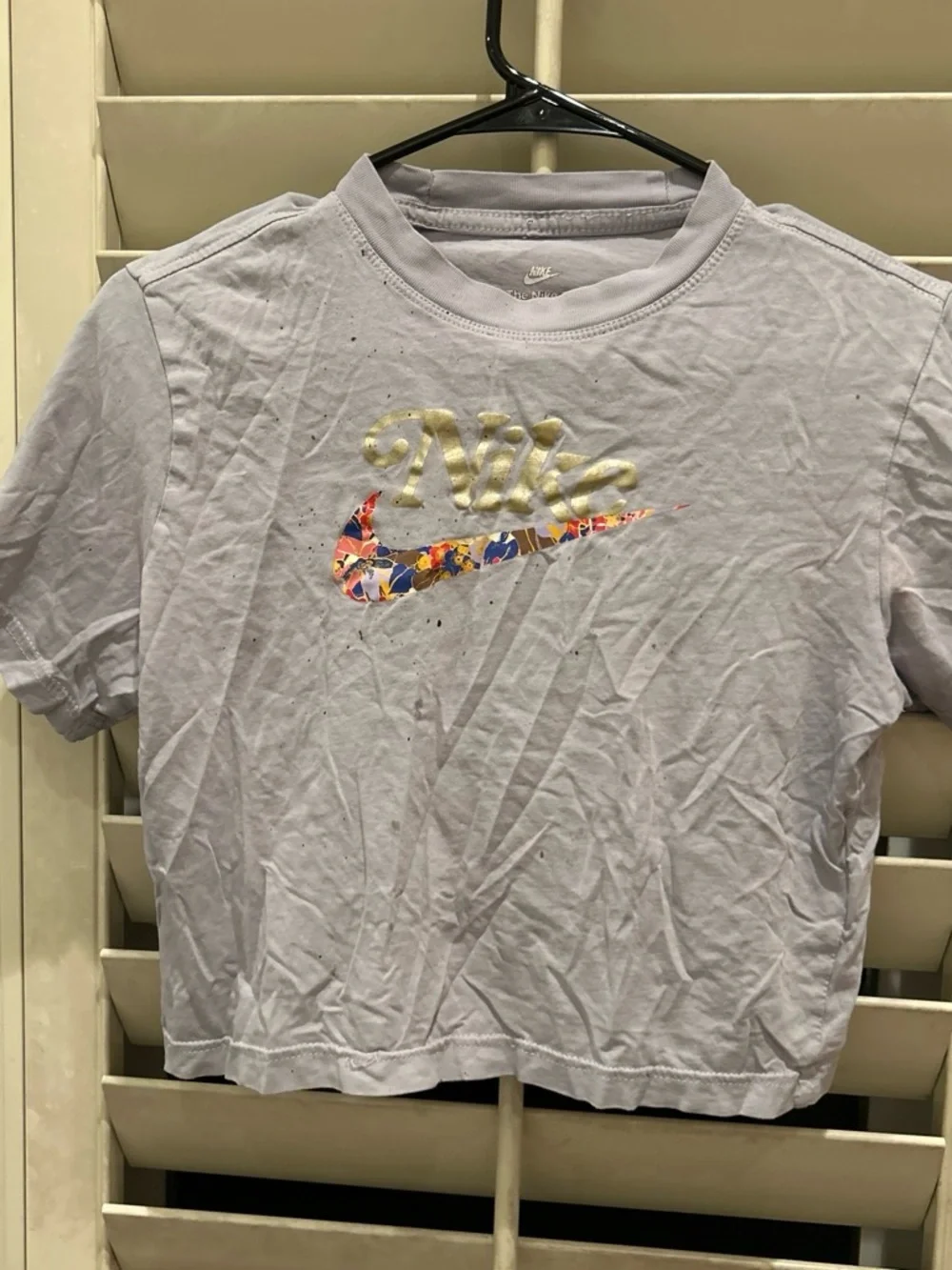 Nike White Tee with Multicolor Floral Swoosh and Gold Script
